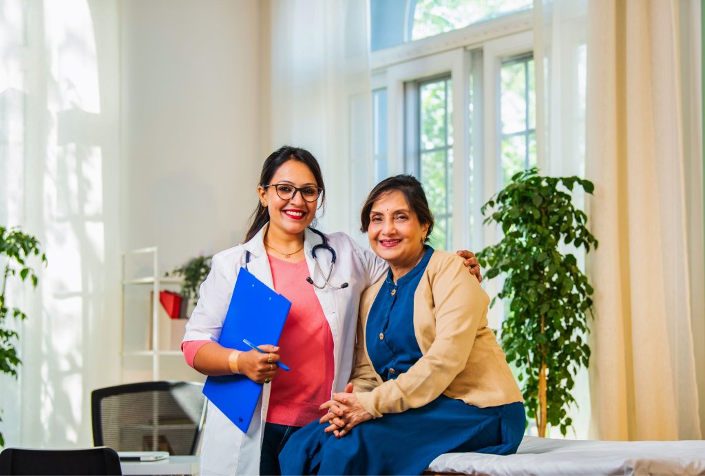 "Doctor supporting midlife woman discussing rheumatoid arthritis and hormone replacement therapy.