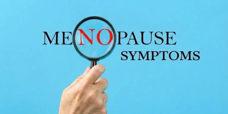 Menopause symptoms explained with magnifying glass highlighting hormonal changes in a woman’s body during midlife