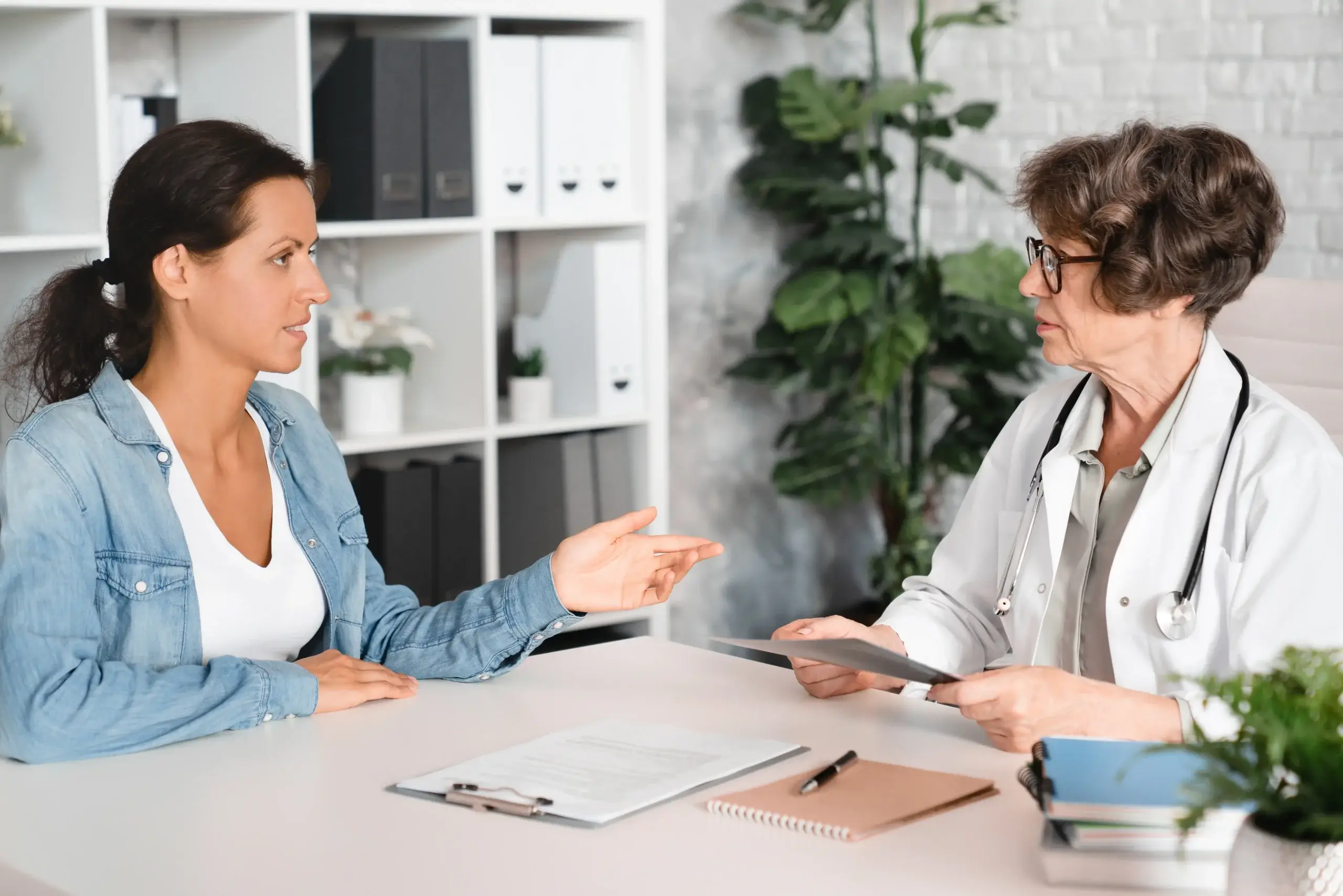 Stages of menopause discussed during a doctor patient consultation