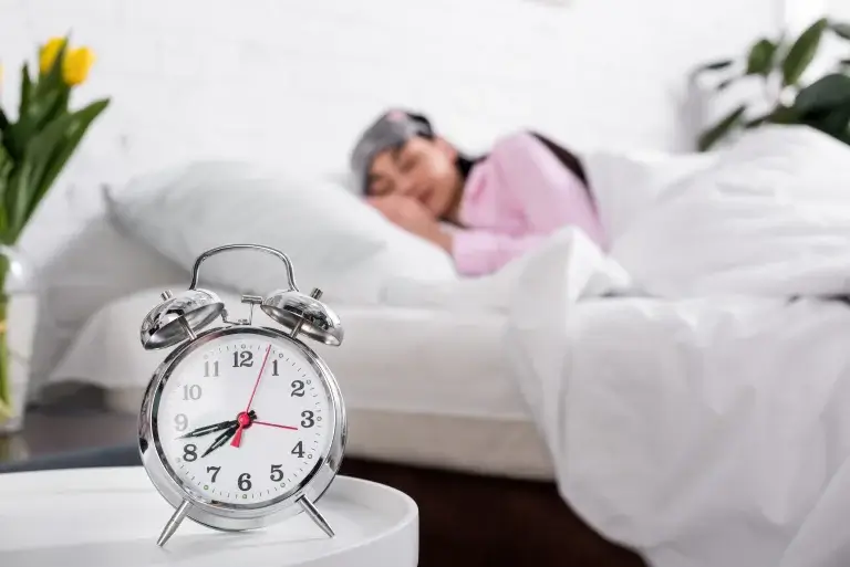 Menopause age women sleeping with alarm on