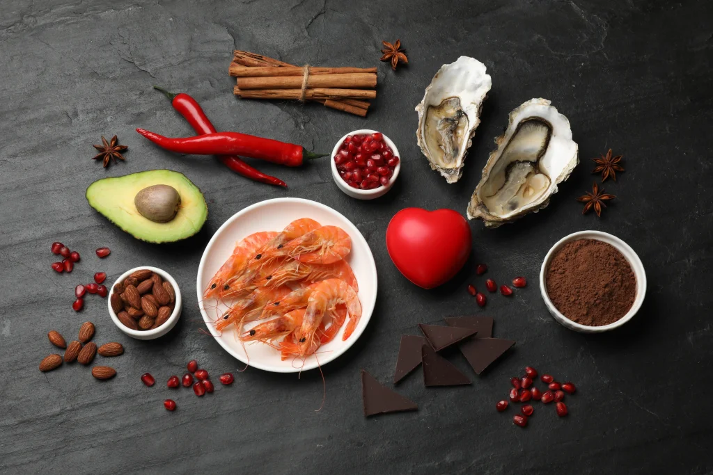 aphrodisiac foods flat lay on a dark stone 2026 06 16 06 30 21 utc