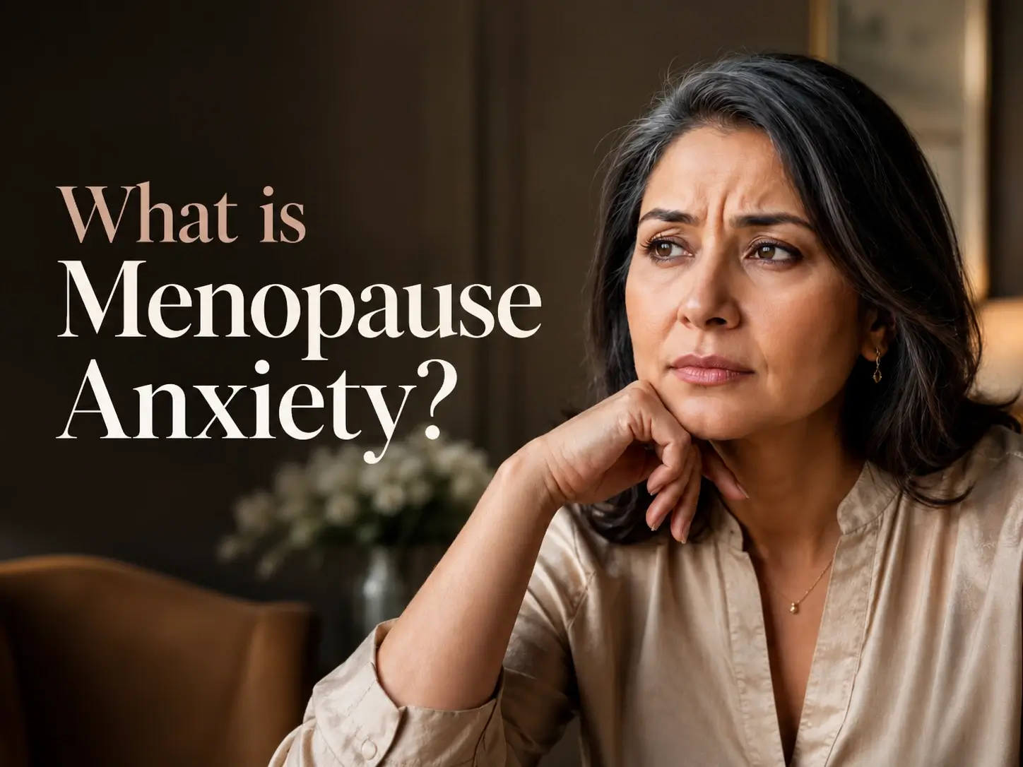 Menopause anxiety hero image showing an Indian midlife woman looking worried and thoughtful, representing anxiety during menopause, emotional overwhelm, sleep disruption and menopause mental health.