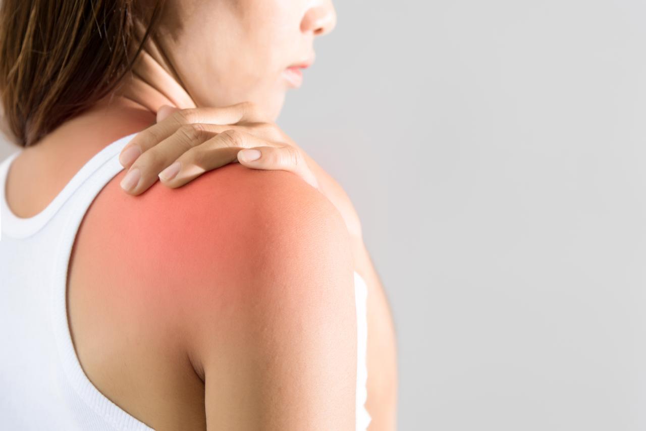 Frozen shoulder in menopause causing shoulder pain, stiffness and restricted movement.