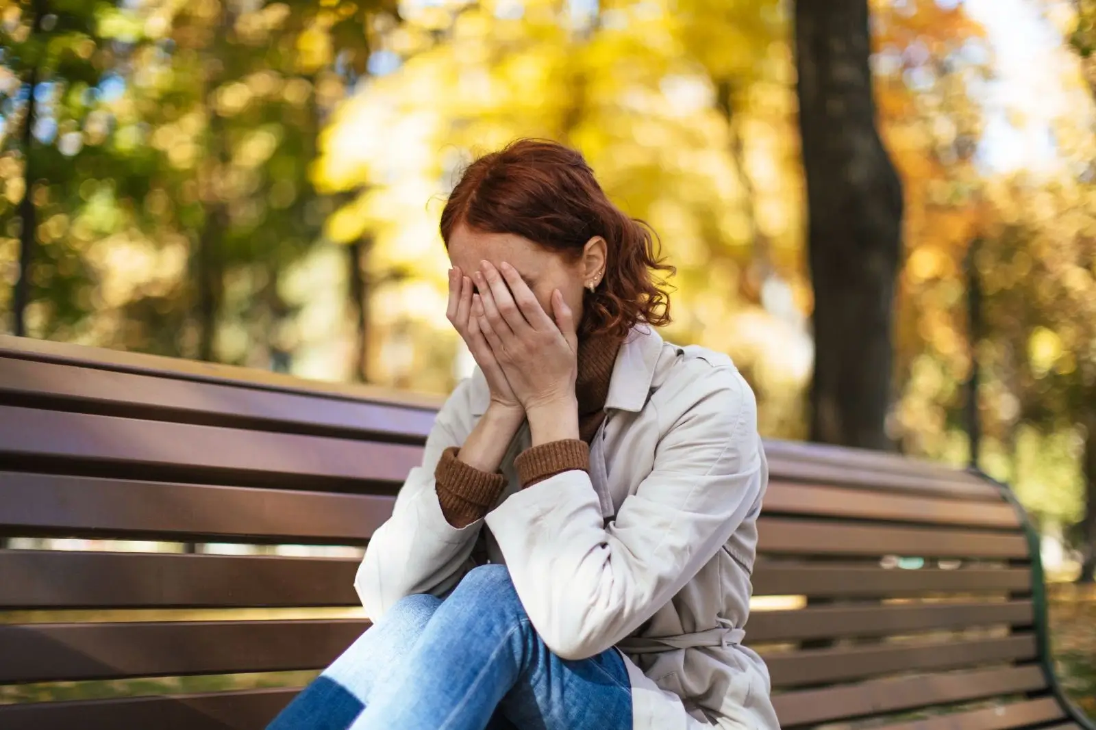 Woman experiencing emotional distress and anxiety during perimenopause.